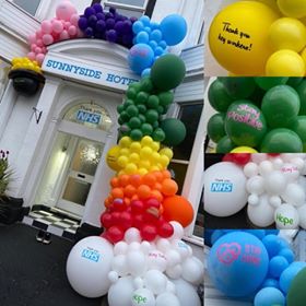 A rainbow balloon arch celebrating NHS workers has been created around the entrance of the Sunnyside Hotel in Southport. Photo by Anthony Duffey