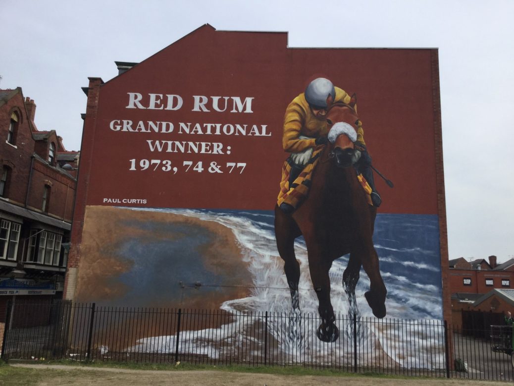 Liverpool mural artist Paul Curtis and the huge Red Rum artwork in Southport