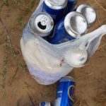 Cans of Fosters discarded in the sand dunes in Southport. Photo by Jonathan Cunningham