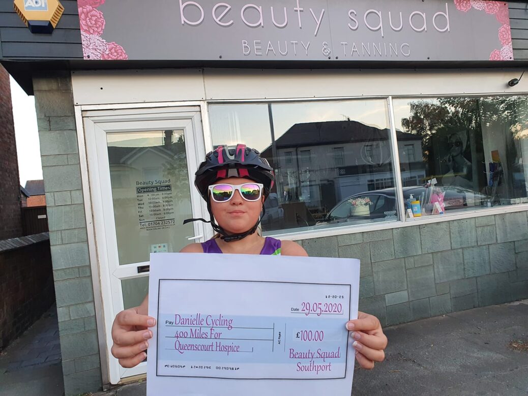Danielle with a £100 donation to her challenge from Beauty Squad on Bispham Road, thanks to owner Hayley Lola White