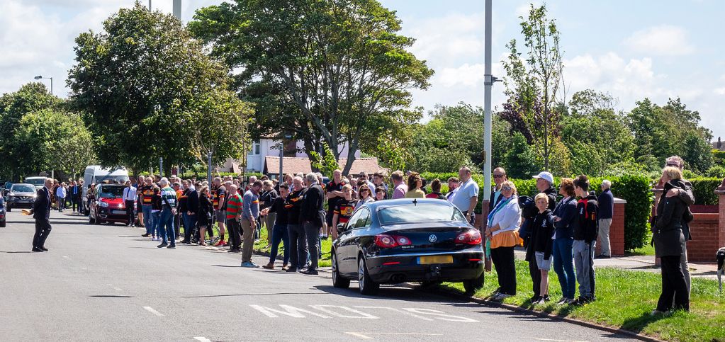 Players and supporters of Southport Rugby Football Club formed a guard of honour along Waterloo Road near the club to pay tribute to Club President Graham Ellis who died aged 64