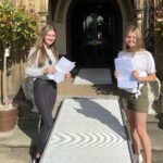 Grace Hawthorn-Gavan with Amelia McKeown celebrate their GCSE results at Scarisbrick Hall School