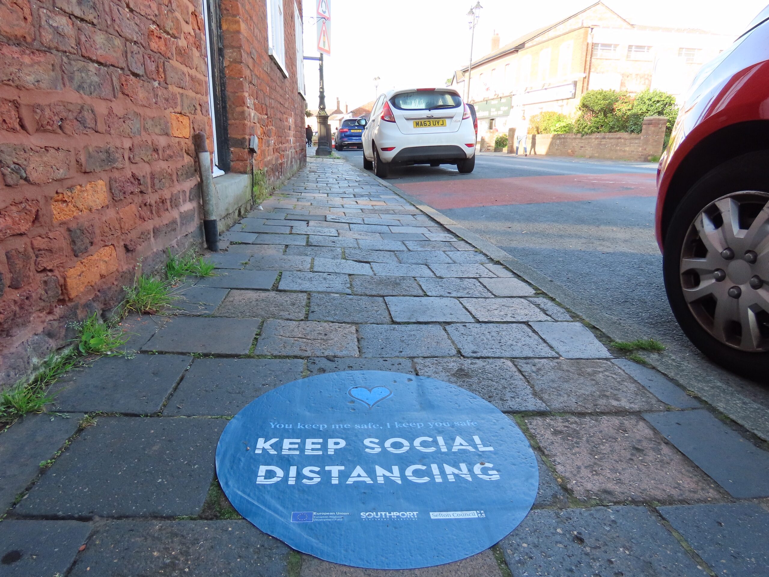 A coronavirus / Covid-19 sign in Churchtown in Southport. Photo by Andrew Brown Media