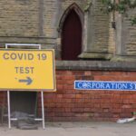 A sign posting towards the Covid-19 / coronavirus testing site on Corporation Street in Southport