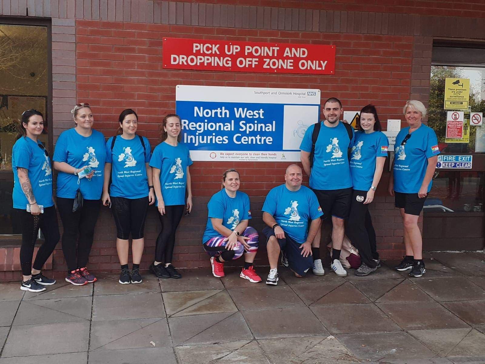 NHS staff from Southport Hospital walked from Southport to Liverpool on Wednesday 17 September, 2020 to raise money for a new minibus for patients at the North West Regional Spinal Injuries Centre in Southport. They are pictured outside Southport Hospital