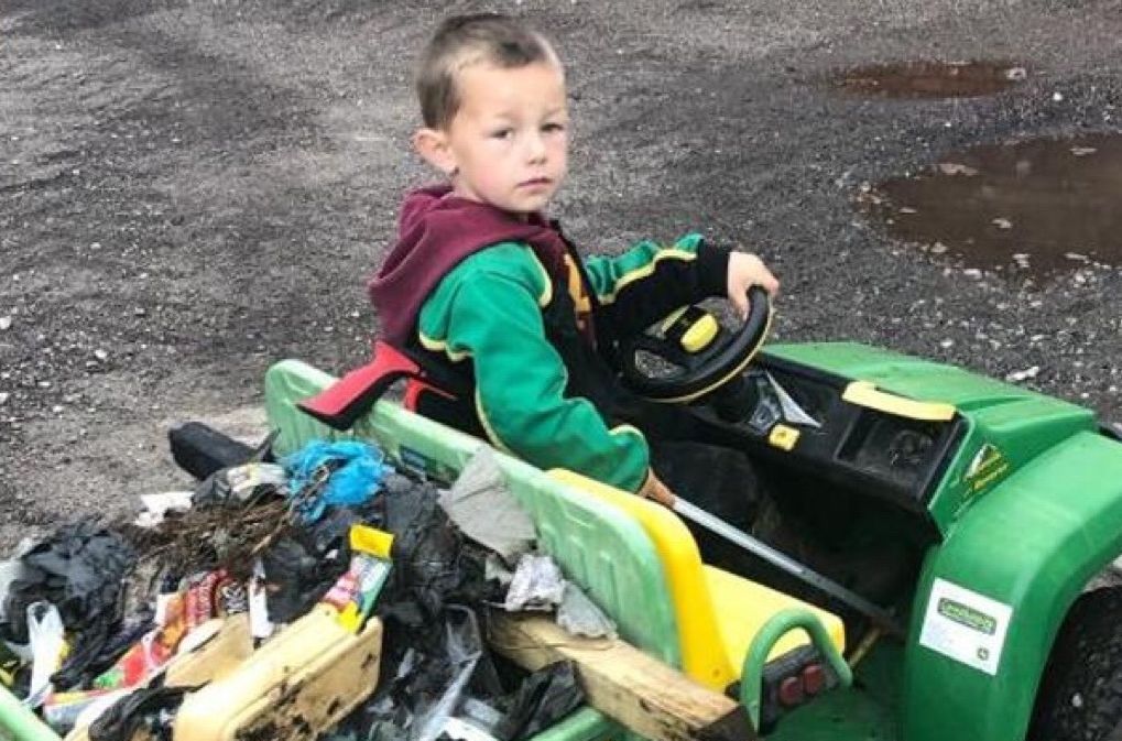 Phillip, aged 4 from Banks, near Southport, has used his battery operated gator and his litter picker to clean up his village