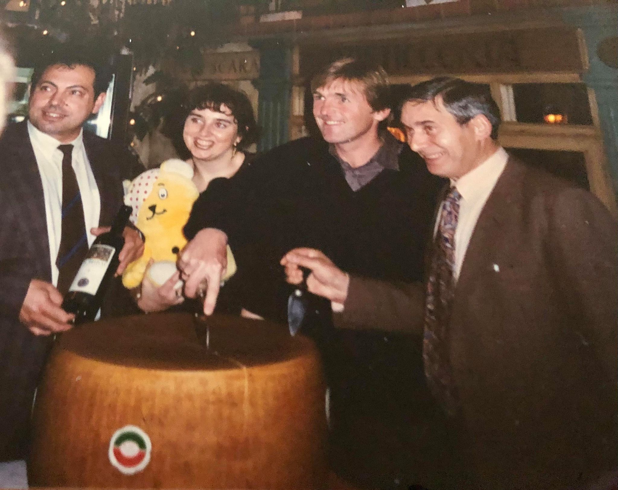 The unveiling of a new Reggiano parmesan cheese wheel at Casa Italia on Lord Street in Southport. Restaurant owner Erasmo Grossi (right) with Liverpool FC star Kenny Dalglish (third left) with Giovanna Grossi and her partner Mario