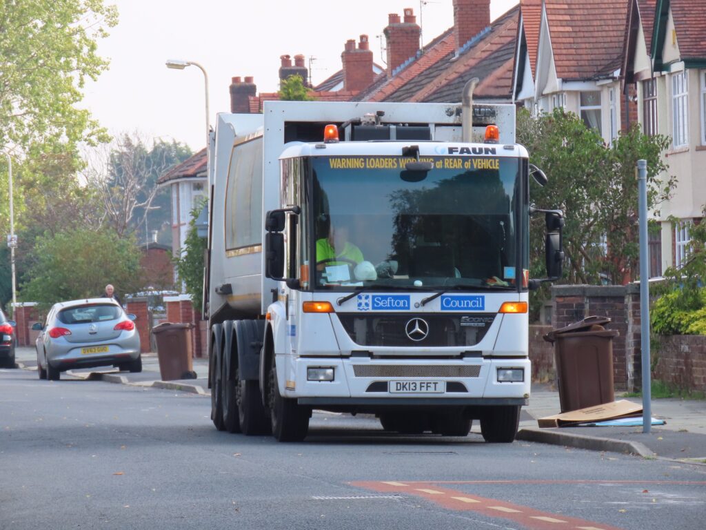 Refuse collectors at work in Southport. Photo by Andrew Brown Media
