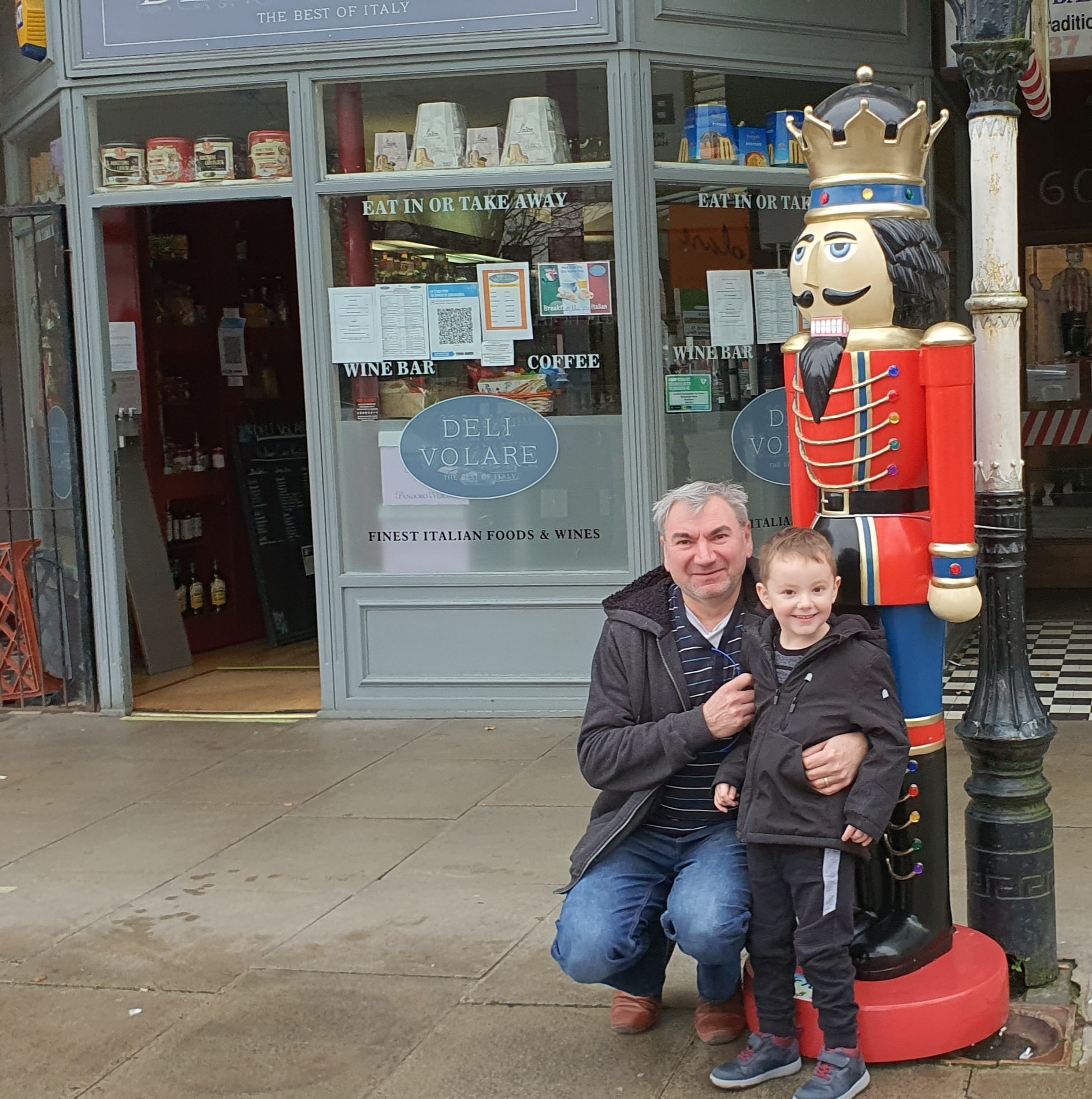 Deli Volare owner Onofrio Maimone with Luca and the 'Sir Tom' Nutcracker named after Capatin Sir Tom Moore on Lord Street in Southport
