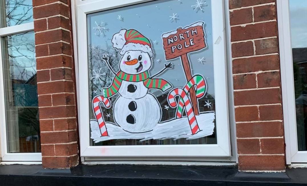 Christmas window artwork by Lauren Ashleigh Art