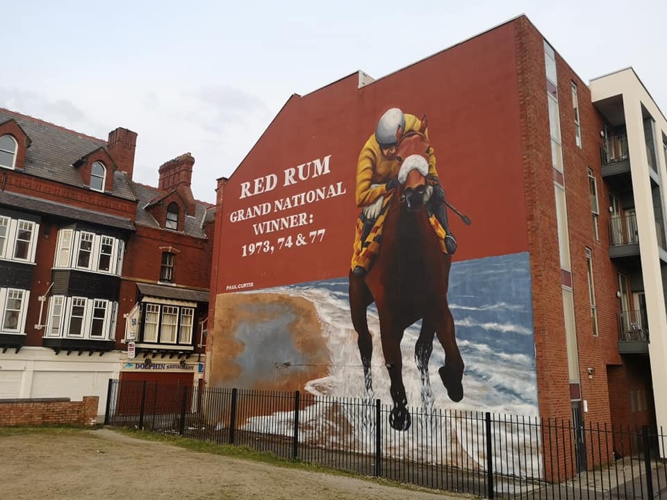 A huge mural of legendary racehorse Red Rum by acclaimed street artist Paul Curtis was unveiled in Southport in March