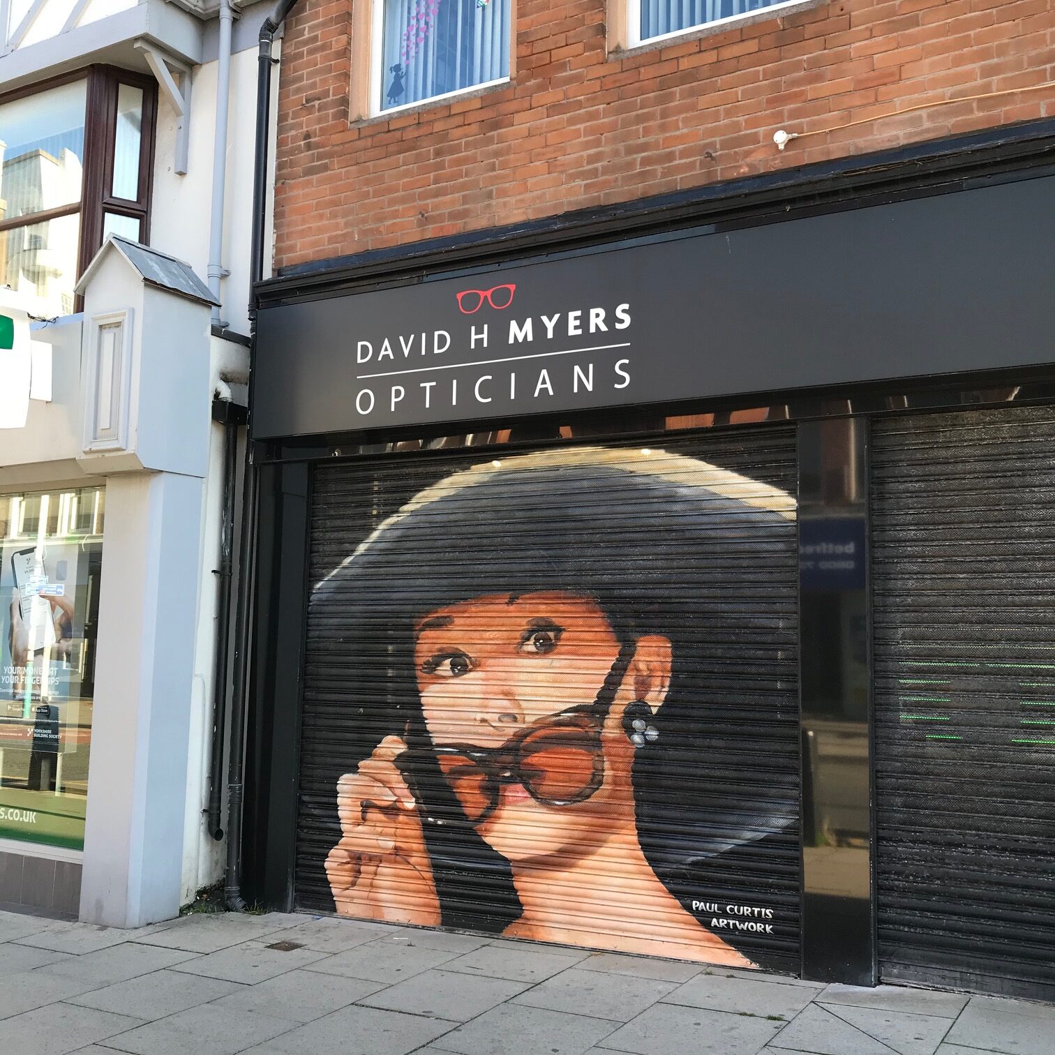 The Audrey Hepburn mural outside David H Myers Opticians on London Street in Southport