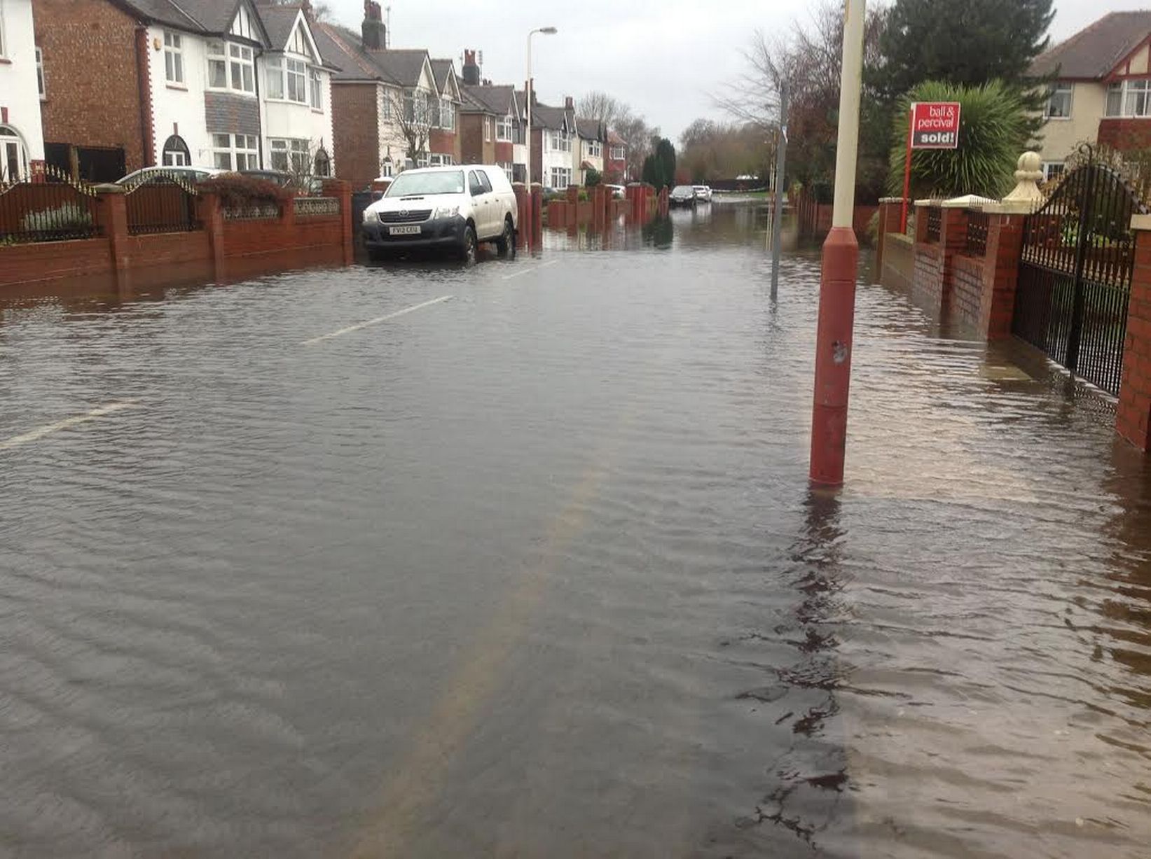 A flooded Verulam Road in Churchtown in Southport. Photo by Andrew Brown Media