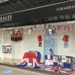 The Royal British Legion window display in the former Beales department store shop window on Lord Street in Southport