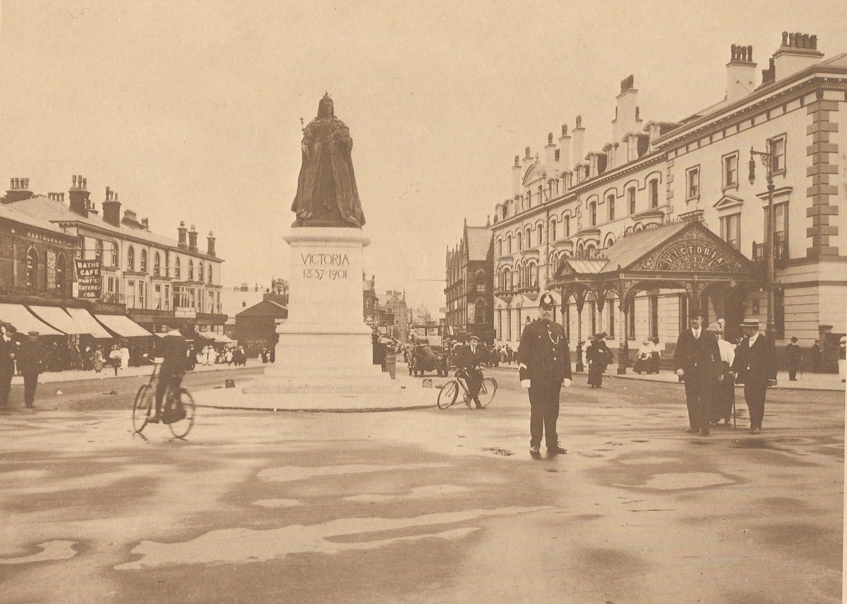 Queen Victoria stands proudly at the top of Nevill Street in Southport, facing the sea. The Victoria Monument and the Victoria Hotel are pictured in 1913. The hotel was replaced by the Maritime Court apartments in the 1970s. The monument was erected in front of Cambridge Hall (now The Atkinson) in 1904 and was moved to Nevill Street in 1912. The Victoria Hotel was built in 1842 and was demolished in 1971. Victoria was the Queen of Great Britain and Ireland between 1837 and her death in 1901. Her reign of 63 years and seven months was longer than any previous British monarch