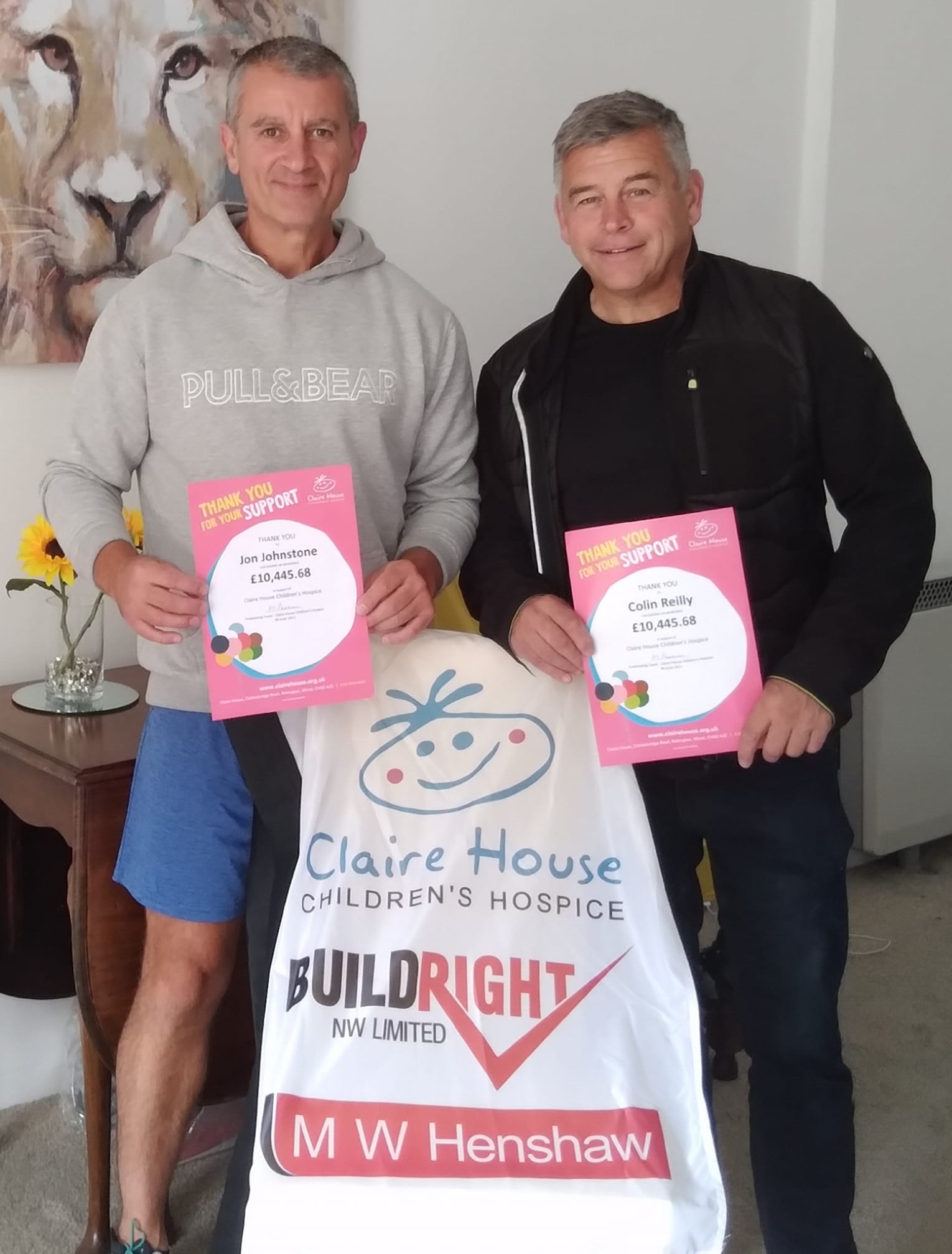Jonny Johnstone and Colin Reilly have been thanked for raising £10,000 for Claire House childrens hospice by running up and down sandhills in Southport 500 times