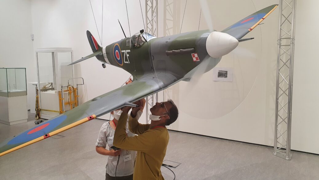 Artist Suhail Shaikh has used paper to create an exact replica sculpture of a World War II Supermarine Spitfire which was flown in 1942 by Polish pilot Sergeant Jerzy Stanislaw Zielinsky of the 308 Krakowski Squadron which was based at RAF Woodvale near Southport. The sculpture is part of the Courage and Devotion exhibition at The Atkinson on Lord Street in Southport which runs from Saturday, 26th June 2021 until Saturday, 12th March 2022