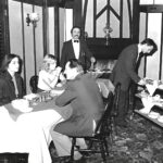 Diners enjoy puddings from a dessert trolley in a restaurant in Southport in June 1983