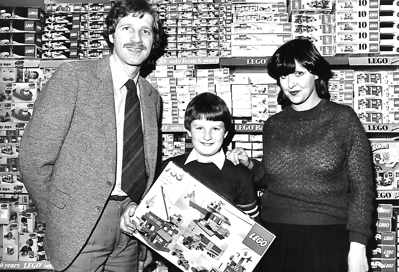 A youngster enjoys receiving an impressive Lego prize from a toy shop in Southport in November 1981. Do you recognise which toy shop this is and where in Southport it was?