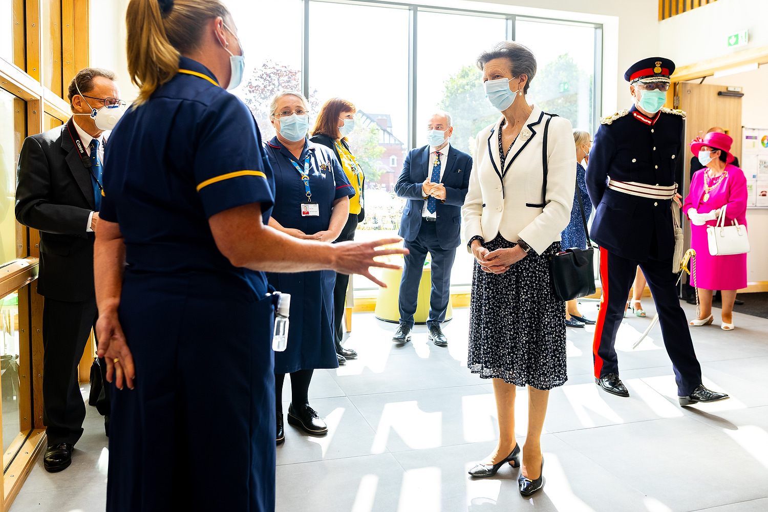 HRH The Princess Royal tours and formally opens the newly built mental health facility at Hartley Hospital , accompanied by Mersey Care NHS Trust Chairman Beatrice Fraenkel and Chief Executive Prof Joe Rafferty CBE as they meet clinicians and service users . Photo credit : Joel Goodman