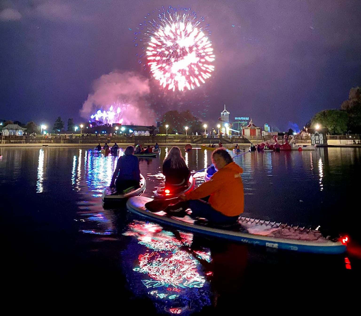 Paddle boarders from SUP North enjoy The British Musical Fireworks Championship from the Marine Lake in Southport. Photo by Alan Taylor