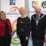 Leader of West Lancashire Freemasons Tony Harrison with Linda McCann, from Preston, and Laurel Devey from Southport, who are partially sighted, and Nicola Hanna, Head of Income Generation at Galloways. Photo taken when the grant was initially awarded