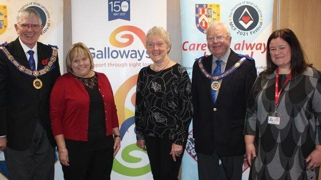 Leader of West Lancashire Freemasons Tony Harrison with Linda McCann, from Preston, and Laurel Devey from Southport, who are partially sighted, and Nicola Hanna, Head of Income Generation at Galloways. Photo taken when the grant was initially awarded