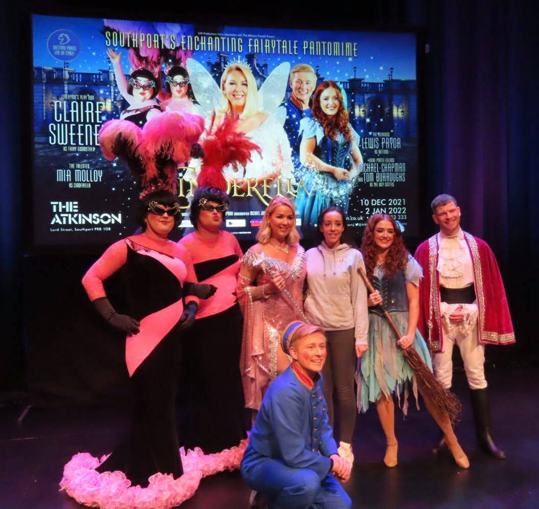 Lauren Wickham (back, fourth from left, with Claire Sweeney third left), owner of The Cake Box in Southport, created a special Cinderella themed cake and cupcakes for the launch of the Cinderella pantomime at The Atkinson in Southport. Photo by Andrew Brown Media