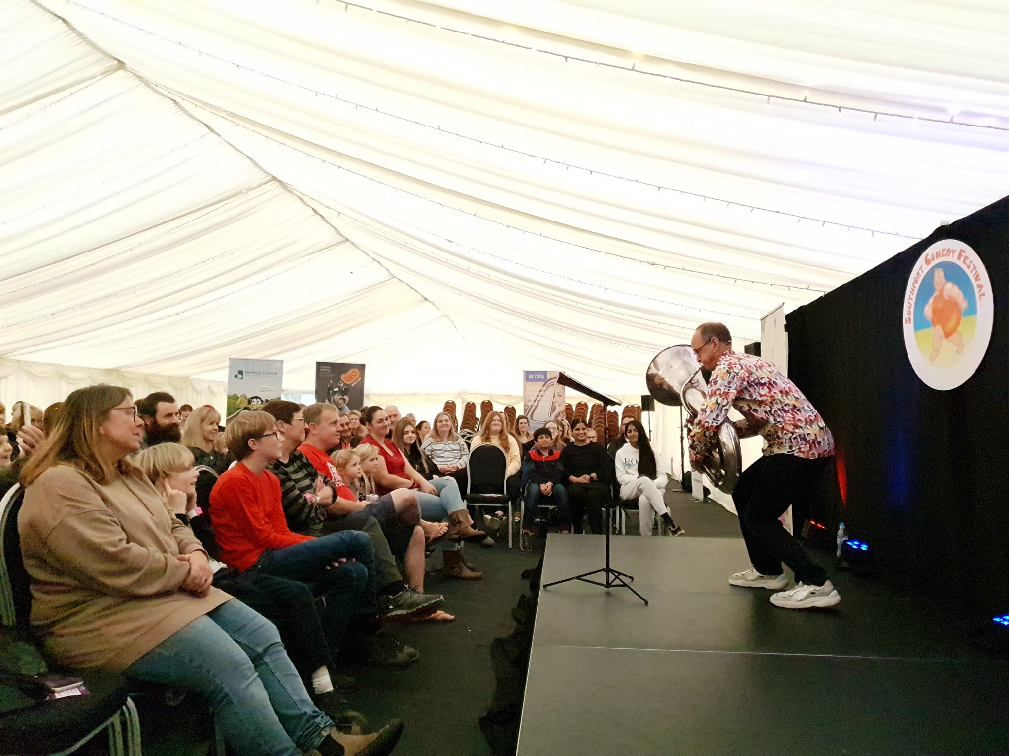 Steve Royel performs at Southport Comedy Festival in a marquee provided by Elite Marquees