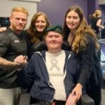 Owen Copland (front) with Alex Ivanoff from Anytime Gym, with Mum Gill and sister Jane