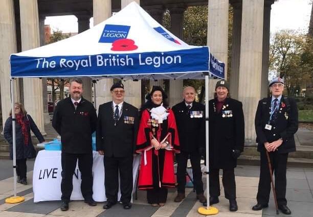 Southport Poppy Appeal was launched at Southport Town Hall. A poppy stall has been placed at The Monument