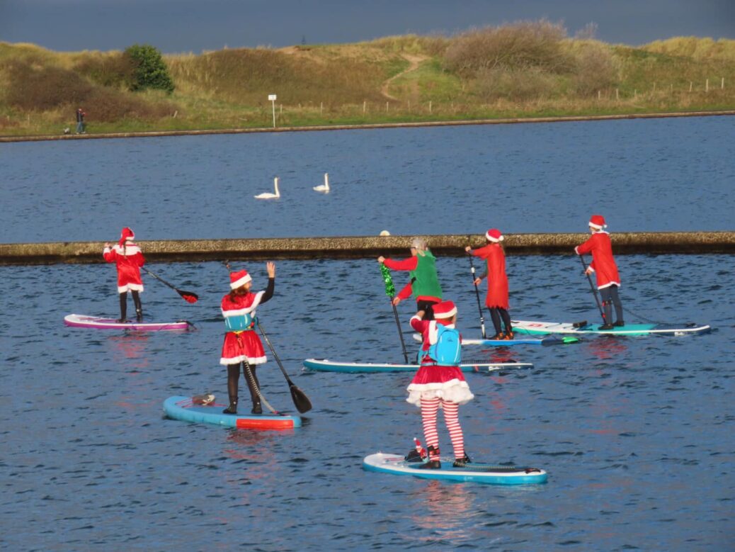 Paddle boarders from SUP North enjoyed festive fancy dress as the 2021 Queenscourt Sants Sprint took place in Southport. Photo by Andrew Brown Media