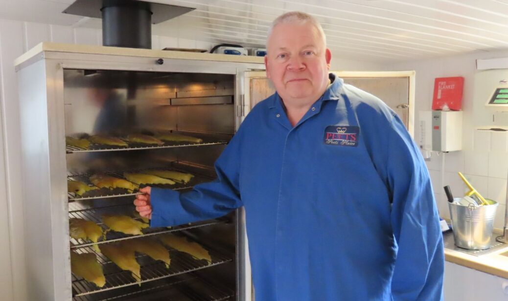 Kevin Peet, owner of Peets Plaice in Churchtown in Southport, with his smoker and his home smoked fish. Photo by Andrew Brown Media