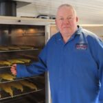 Kevin Peet, owner of Peets Plaice in Churchtown in Southport, with his smoker and his home smoked fish. Photo by Andrew Brown Media