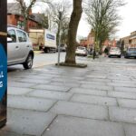 A Covid-19 social distancing sign in Birkdale Village in Southport. Photo by Andrew Brown Media