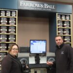 Steve Dunbavin and Lisa Pennington with the Farrow & Ball paint mixing machine at Paint n Paper in Birkdale in Southport. Photo by Andrew Brown Media