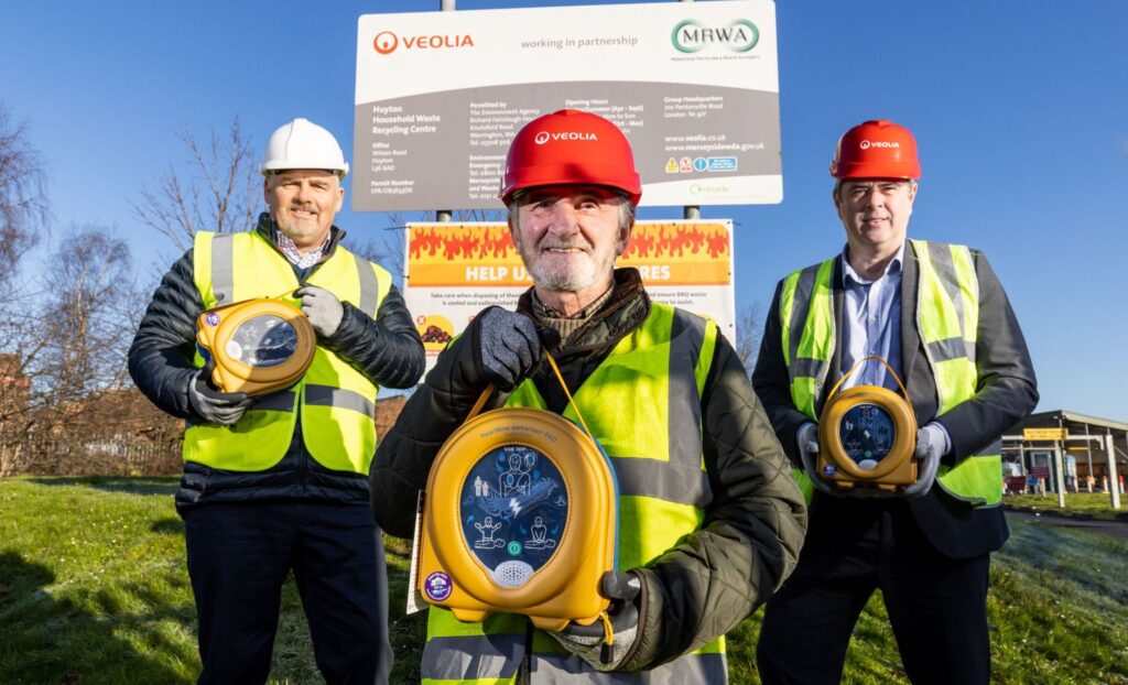 MRWA Chief Executive Carl Beer (left), MRWA Chairperson Councillor Tony Concepcion (centre), & Director of Veolia Merseyside & Halton Jeff Sears (right) at Huyton Household Waste Recycling Centre