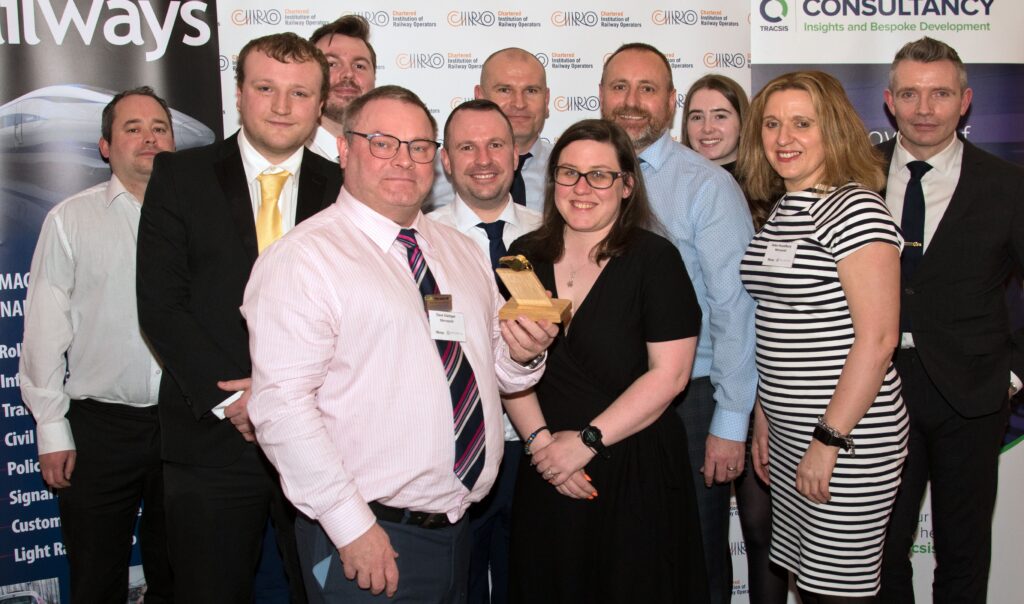 Merseyrail staff with the Golden Whistle award