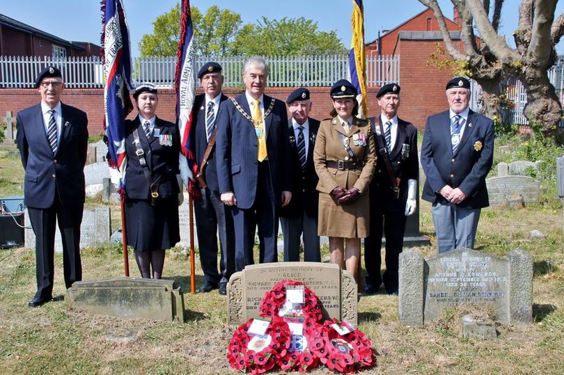 At the grave of Private Richard George Masters VC in Southport. The Mayor and Major Danielle Aspin plus Standard Bearers and Veterans. Photo by Major Roy Bevan
