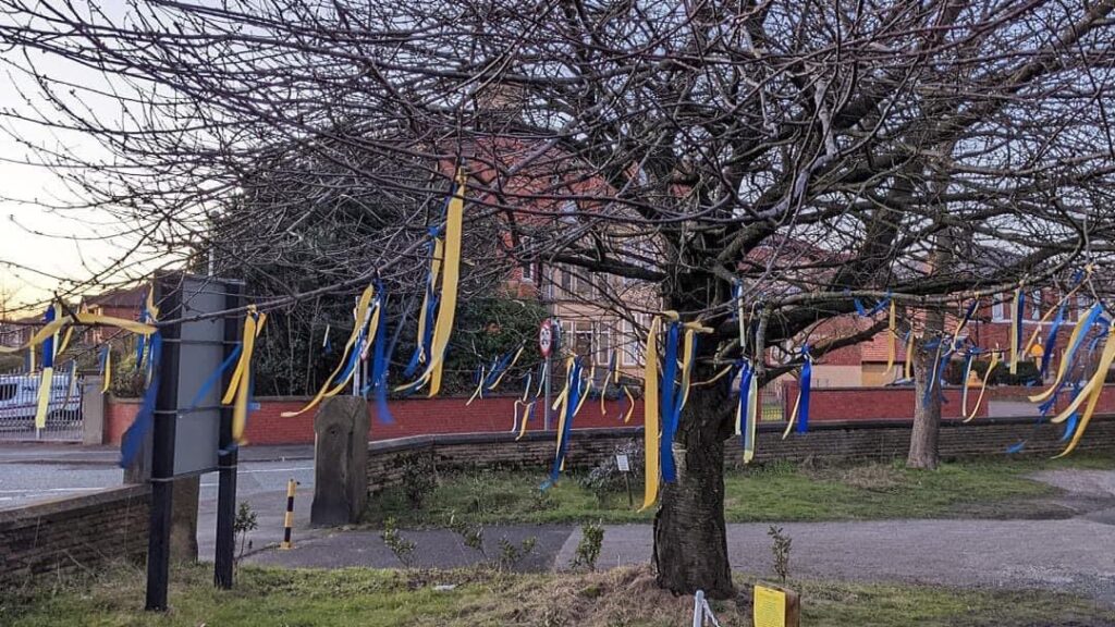 This tree outside the Church Of St Philip & St Paul With Wesley on Hampton Road is glowing with the colours of Ukraine’s blue and yellow