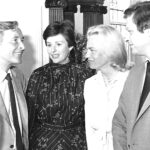 Carry On star Kenneth Williams (left) chats with fellow guests at a Granada Lunch in Southport in June 1983