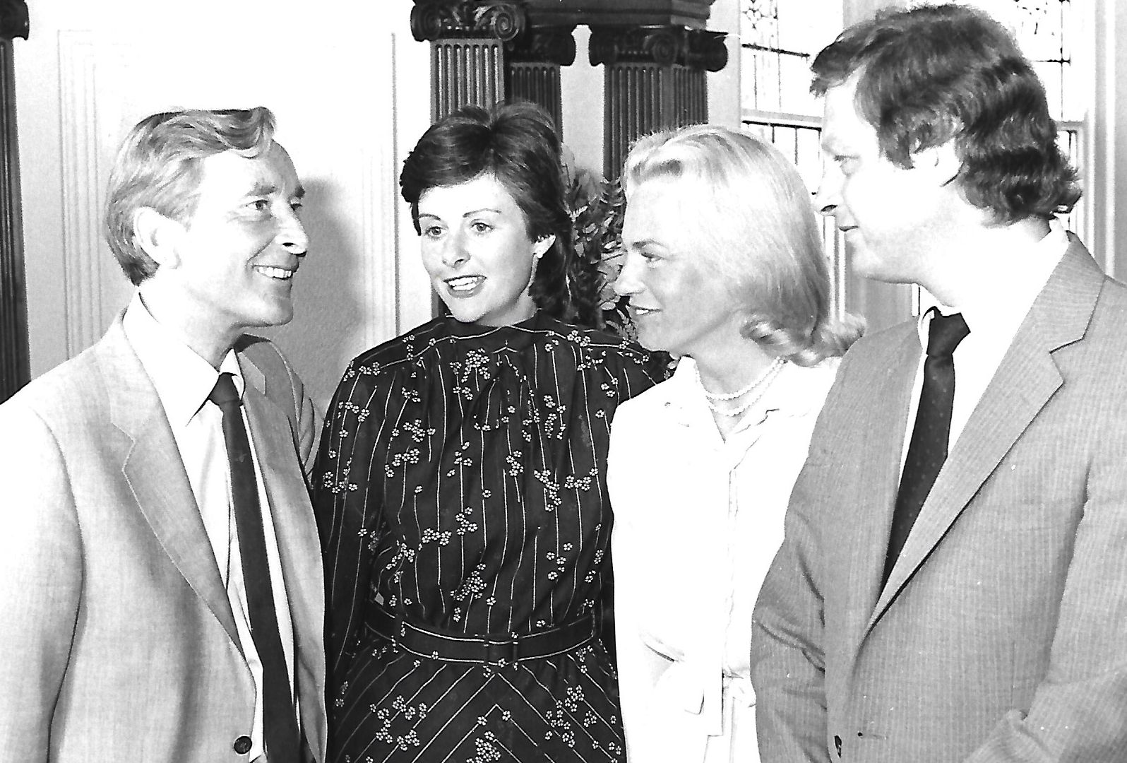 Carry On star Kenneth Williams (left) chats with fellow guests at a Granada Lunch in Southport in June 1983