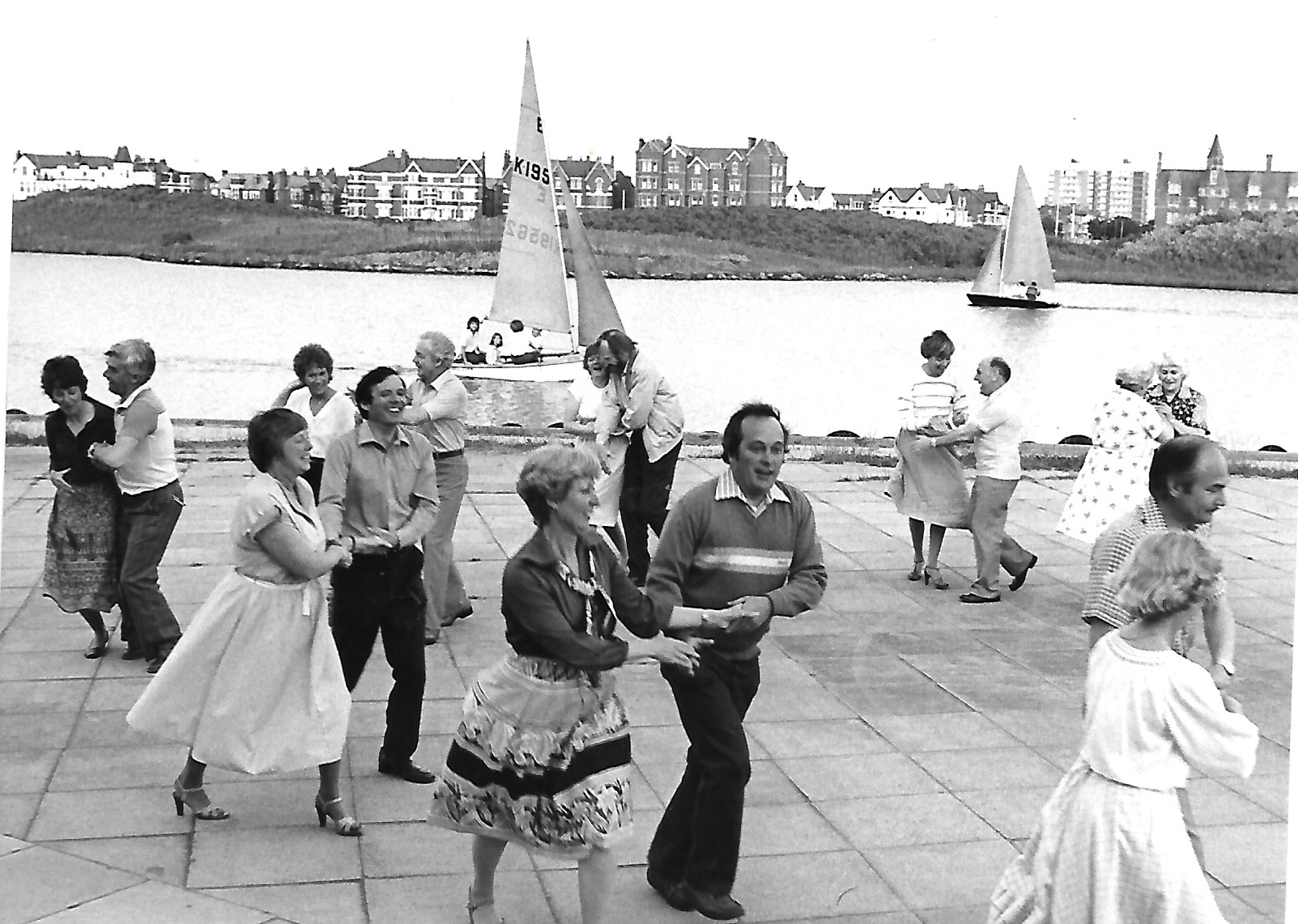 Guests enjoy the Southport Sailing Club Barn Dance at the club, next to Marine Lake in Southport, in June 1983