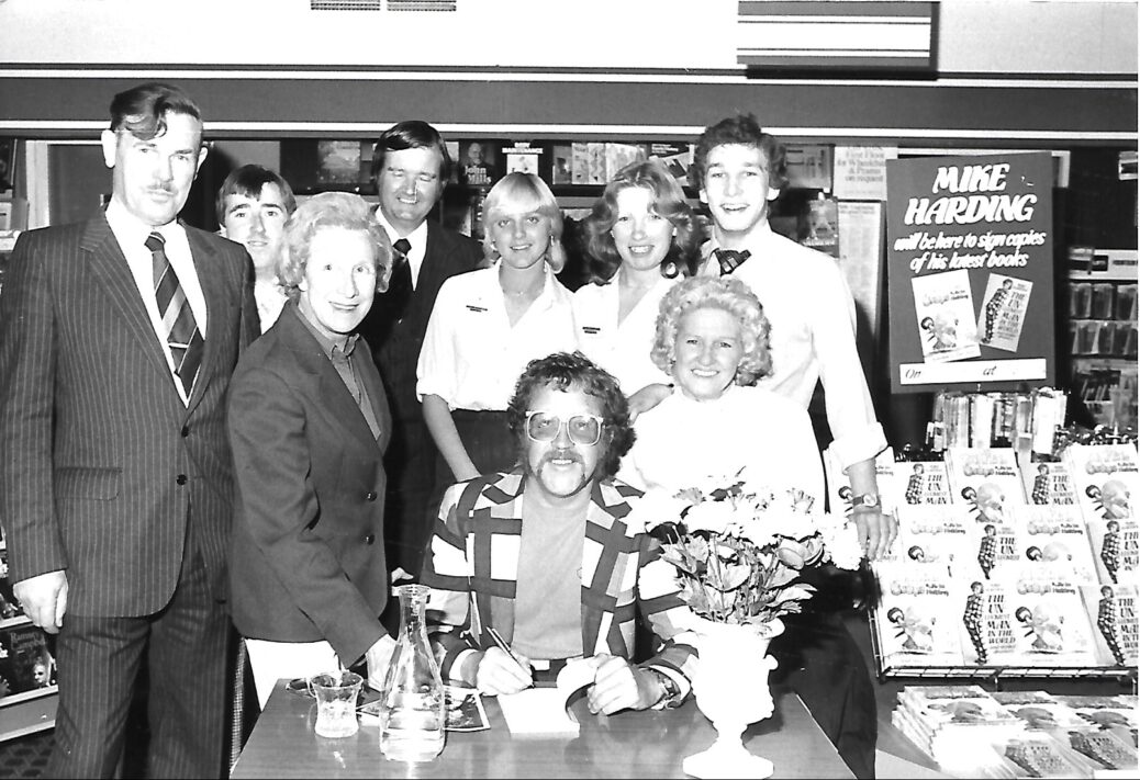Mike Harding signs copies of his latest books in Southport in October 1980