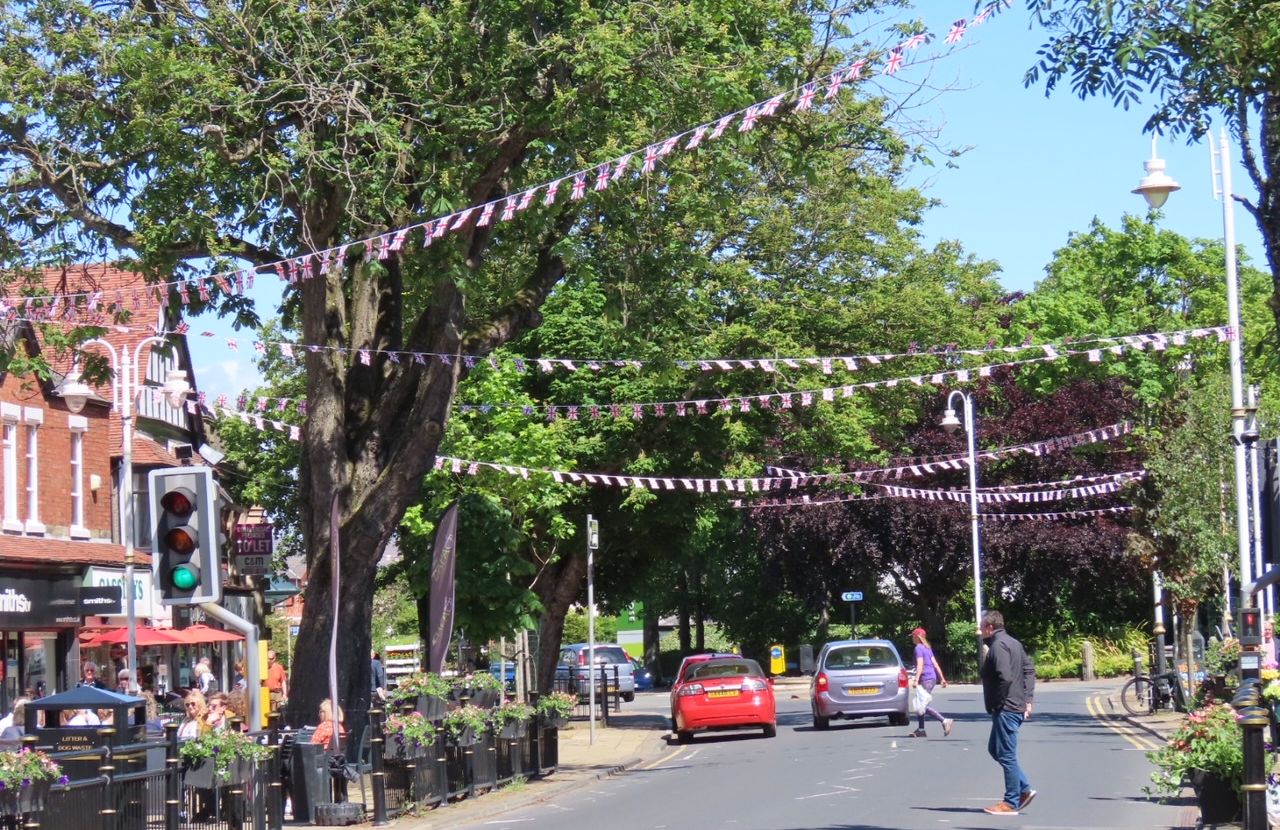 Formby Village has been decorated with hundreds of metres of bunting to celebrate The Queens Platinum Jubilee by IllumiDex UK Ltd. Photo by Andrew Brown Media