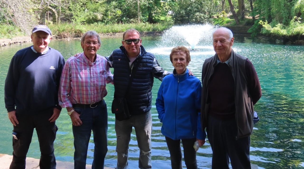 From left: Paul Sherman; Peter Smith-Crallan; David Rawsthorne; Ann Cobham; and David Cobham next to the new fountain in the lake at the Botanic Gardens in Churchtown in Southport. Photo by Andrew Brown Media