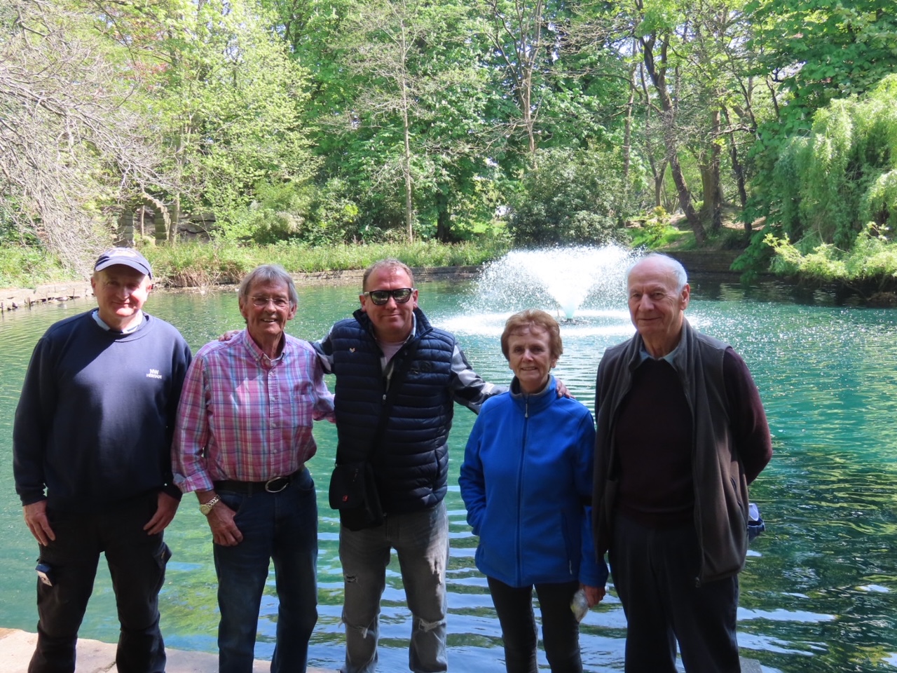 From left: Paul Sherman; Peter Smith-Crallan; David Rawsthorne; Ann Cobham; and David Cobham next to the new fountain in the lake at the Botanic Gardens in Churchtown in Southport. Photo by Andrew Brown Media