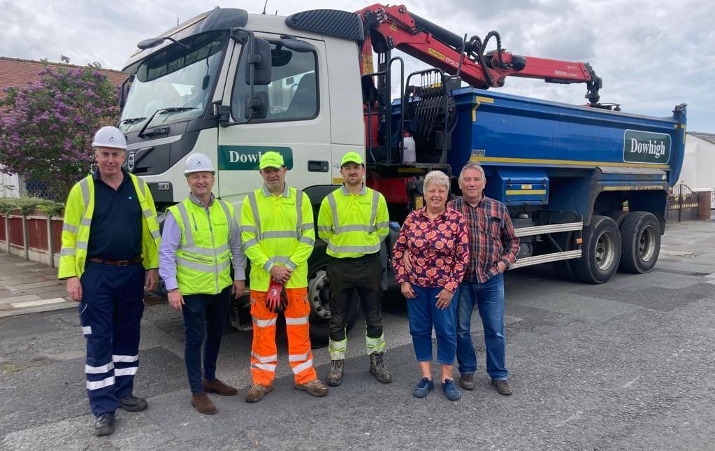 Dowhigh joined forces with the Daily Express and JCB to help the residents of Knob Hall Lane in Churchtown, which was plagued with dozens of potholes