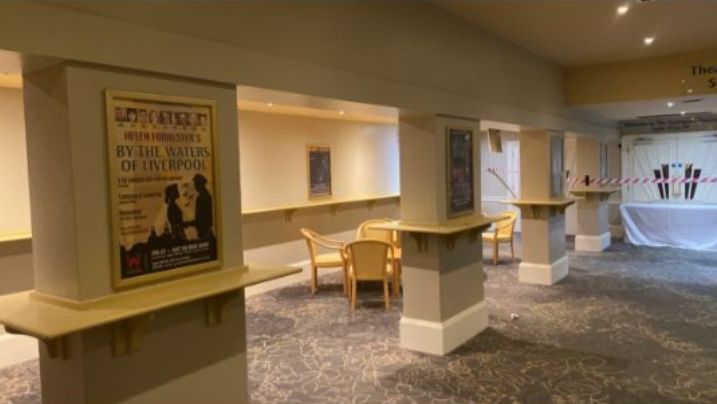 Brass effect advertising frames for sale at Southport Theatre