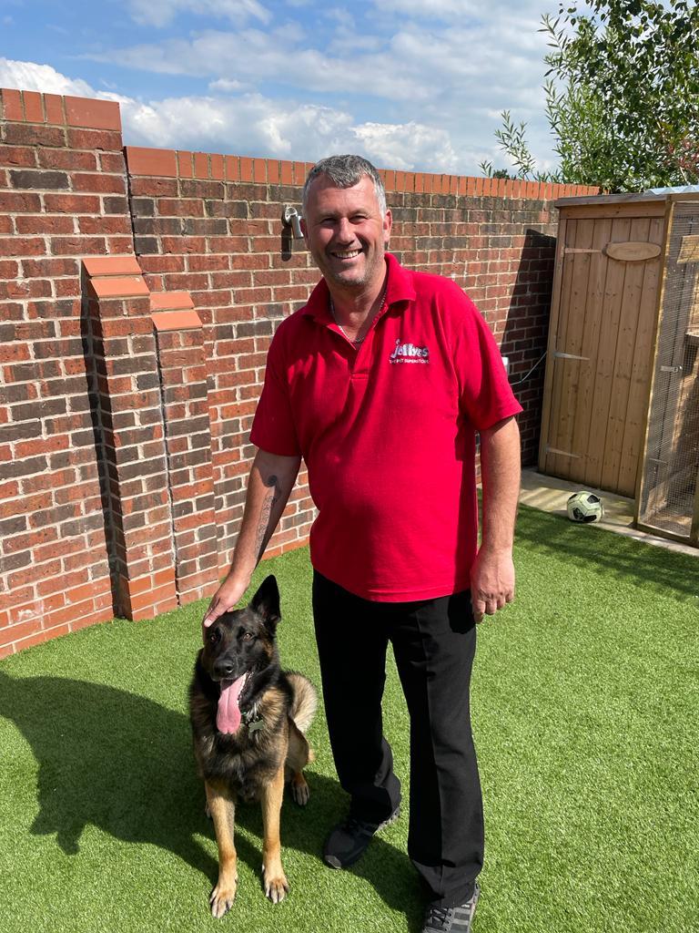 Jollyes Manager Martin Pitt with his dog Leo